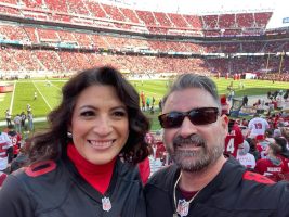 Chris and Laura at the 49ers game in 2021.